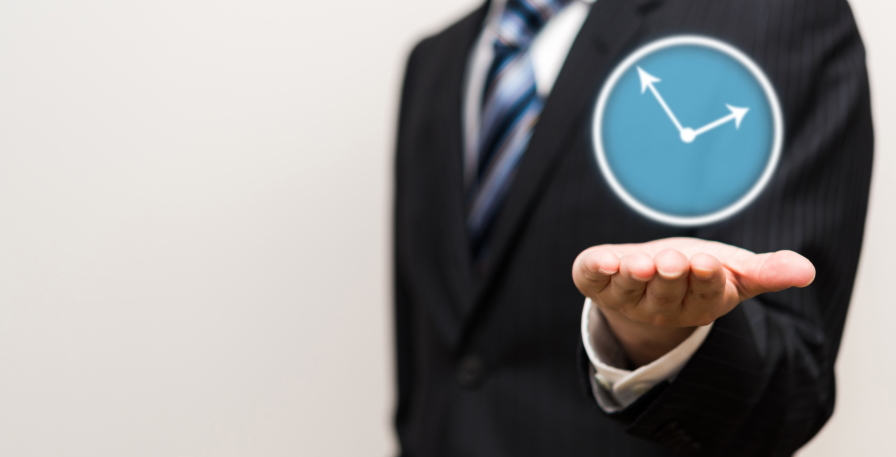 時計とビジネスマン